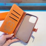 【HERMES】エルメス オレンジ きんぞく 電話ケース zm
