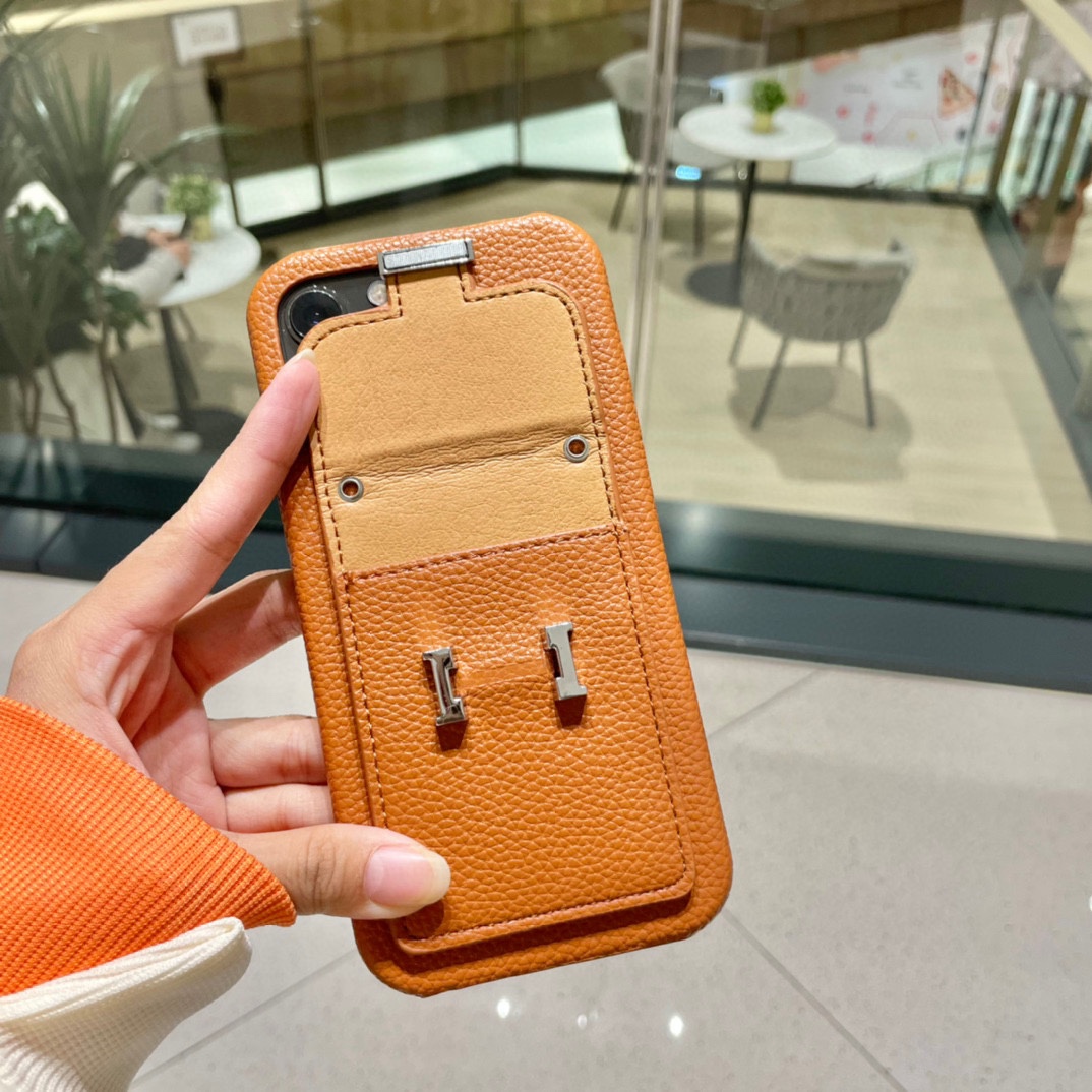 16071872468376184863001820_1 【HERMES】エルメス オレンジ きんぞく 電話ケース zm - 画像 (1)