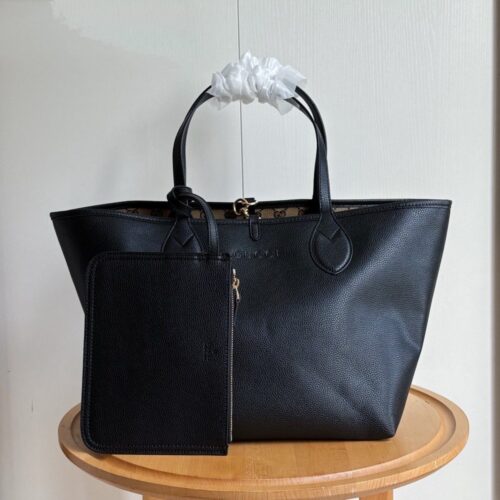 【AT10603】上品な都市の黒牛革ハンドバッグ - 優雅な曲線デザイン、13インチ対応 | Gucci Italy
