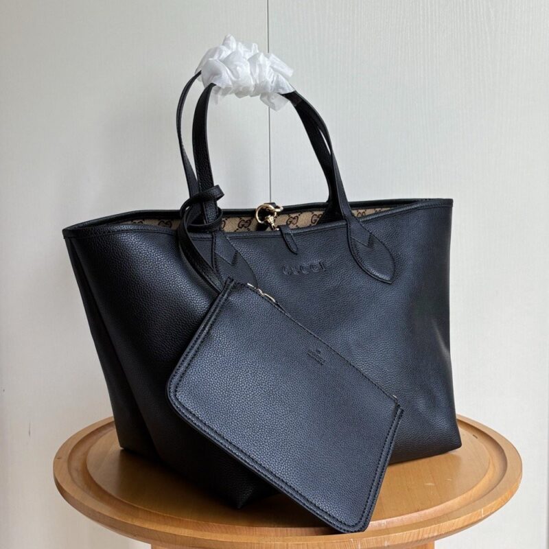 【AT10603】上品な都市の黒牛革ハンドバッグ - 優雅な曲線デザイン、13インチ対応 | Gucci Italy