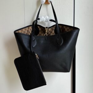 【AT10603】上品な都市の黒牛革ハンドバッグ - 優雅な曲線デザイン、13インチ対応 | Gucci Italy