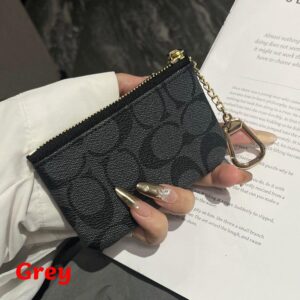【AT13741】コーチのクラシックなエンボス加工コインケース - 軽奢なファッションの魅力を体現 | Coach
