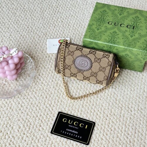 【AT1729】GUCCI/グッチ新作、女性用、ベージュ/黒色キャンバス素材、イチゴのジッパー付きコインケース