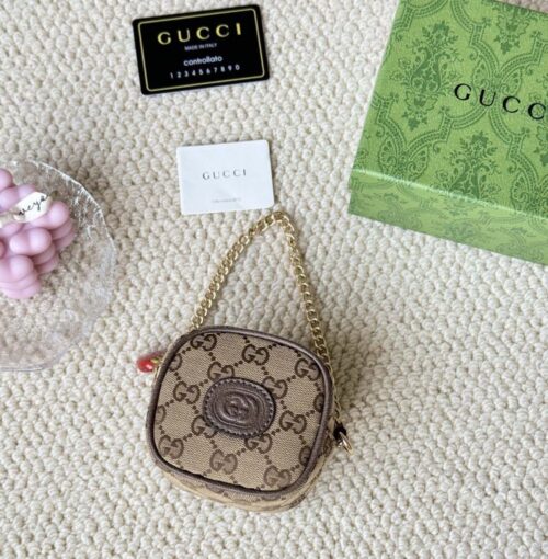 【AT1733】GUCCI/グッチの新作、女性用のクリーム色/ウッド調のキャンバス製のストロベリープリントファスナー付きコインケース