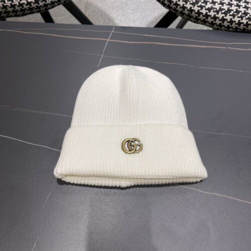 【AT2082】GUCCIのファッショナブルなフレンチスタイルの羊毛ニット帽子は、冬の暖かさを提供するために設計されています。モダンなストライプ柄のニット帽子。