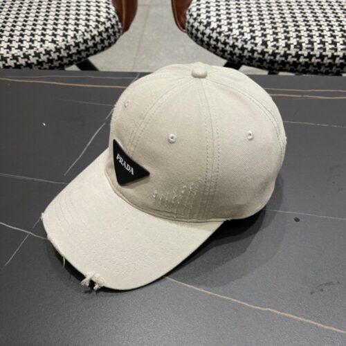 【AT2261】Prada プラダのトレンディな三角ロゴベースボールキャップはシンプルで格好いいです。男女兼用で超かっこいいストリートファッション。帽子の形も素晴らしいです。
