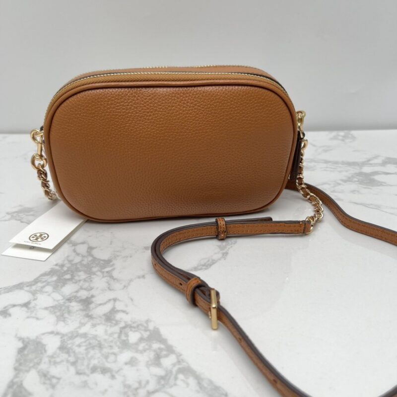 【AT2531】Tory Burchの新しい女性用カメラバッグ、リッチフライトレザー、ショルダーバッグ、斜め掛け小さい丸いバッグ、レザーバッグ、ダブルジッパー。