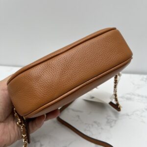 【AT2531】Tory Burchの新しい女性用カメラバッグ、リッチフライトレザー、ショルダーバッグ、斜め掛け小さい丸いバッグ、レザーバッグ、ダブルジッパー。