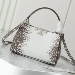【AT2663】Tory Burchの新作eleanorレザーハンドバッグは、上質なスエードレザートリムが施されています