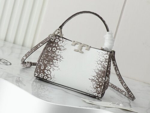 【AT2663】Tory Burchの新作eleanorレザーハンドバッグは、上質なスエードレザートリムが施されています