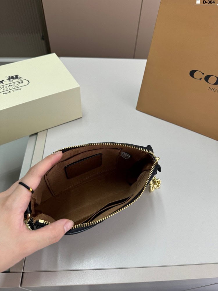 【AT2833】Coachのアンダーバッグ、浮彫り塗装、このバッグは小さなスカートに合わせると素晴らしいです！確かに完売商品です
