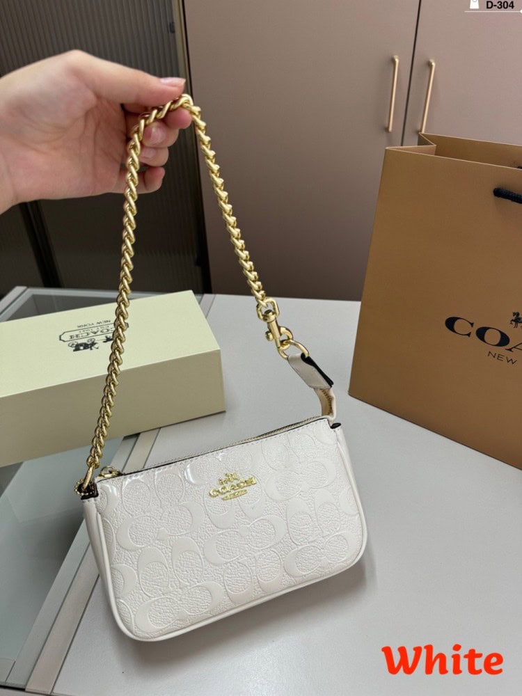 【AT2833】Coachのアンダーバッグ、浮彫り塗装、このバッグは小さなスカートに合わせると素晴らしいです！確かに完売商品です