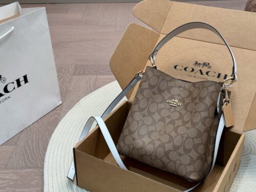 【AT2844】Coach のバケツバッグは万能でクラシック、断れない魅力があります。品位が光る、高級感満載。