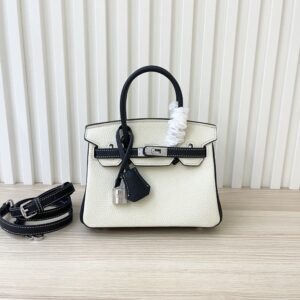 【AT3577】Hermes エルメスのクラシックなリズリボン柄のハンドバッグ（黒と白のツートンカラー）。