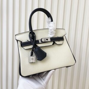 【AT3577】Hermes エルメスのクラシックなリズリボン柄のハンドバッグ（黒と白のツートンカラー）。