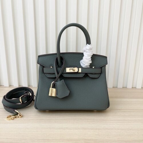 【AT3582】Hermes エルメスのクラシックなハンドバッグ。高級な深緑色とゴールドのボタン。