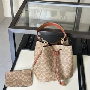 【AT9325】Coach(コーチ)モノグラム柄バケツバッグ、エレガントで贅沢なデザイン | Coach New York
