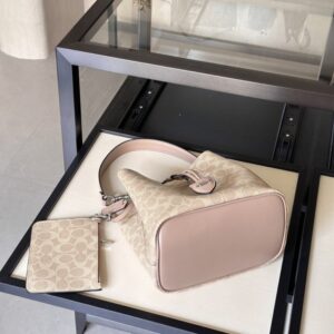【AT9326】Coachのクラシックなモノグラム柄バケツバッグ - 都市の必需品 | Coach New York