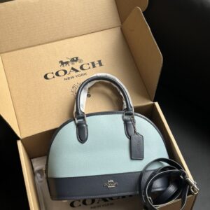 【AT9328】Coach（コーチ）の贝殻型バッグ - 都会の控えめな贅沢とエレガントな質感を体現 | Coach