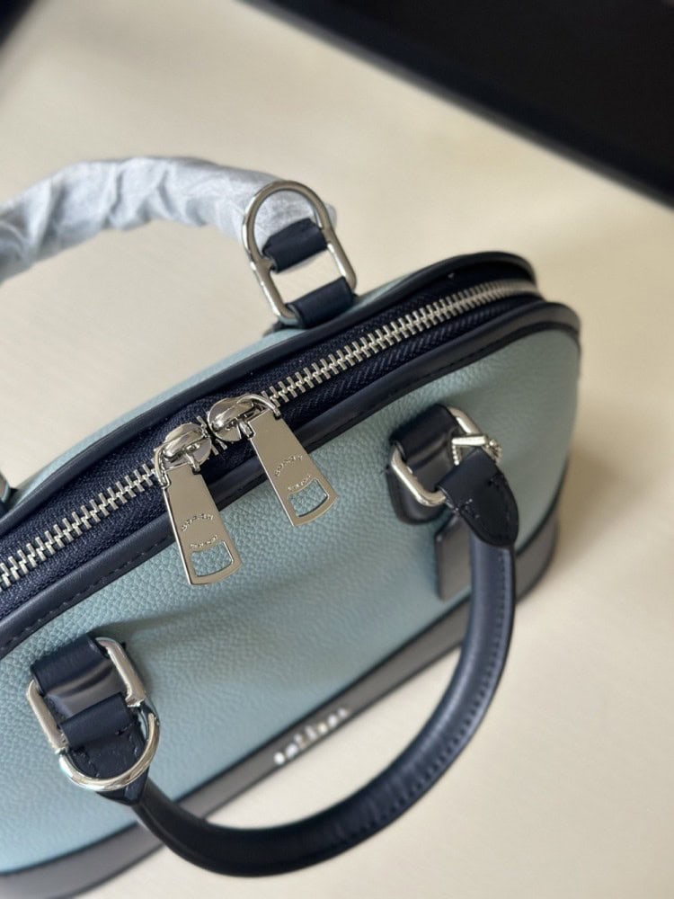 【AT9328】Coach（コーチ）の贝殻型バッグ - 都会の控えめな贅沢とエレガントな質感を体現 | Coach