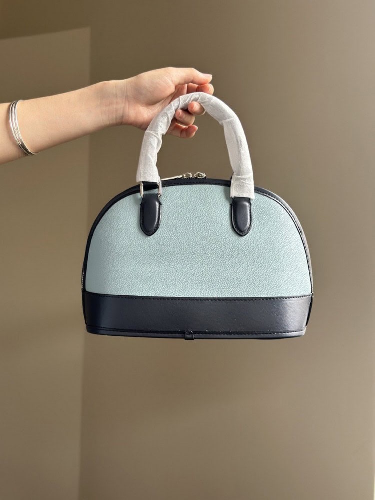 【AT9328】Coach（コーチ）の贝殻型バッグ - 都会の控えめな贅沢とエレガントな質感を体現 | Coach