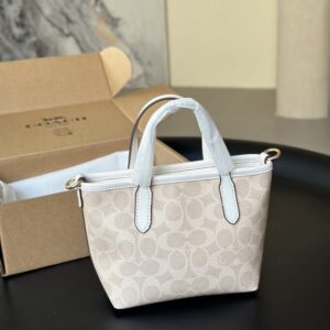 【AT9332】Coachクラシックシリーズハンドバッグ、エレガントなミルクホワイト色 | Coach New York