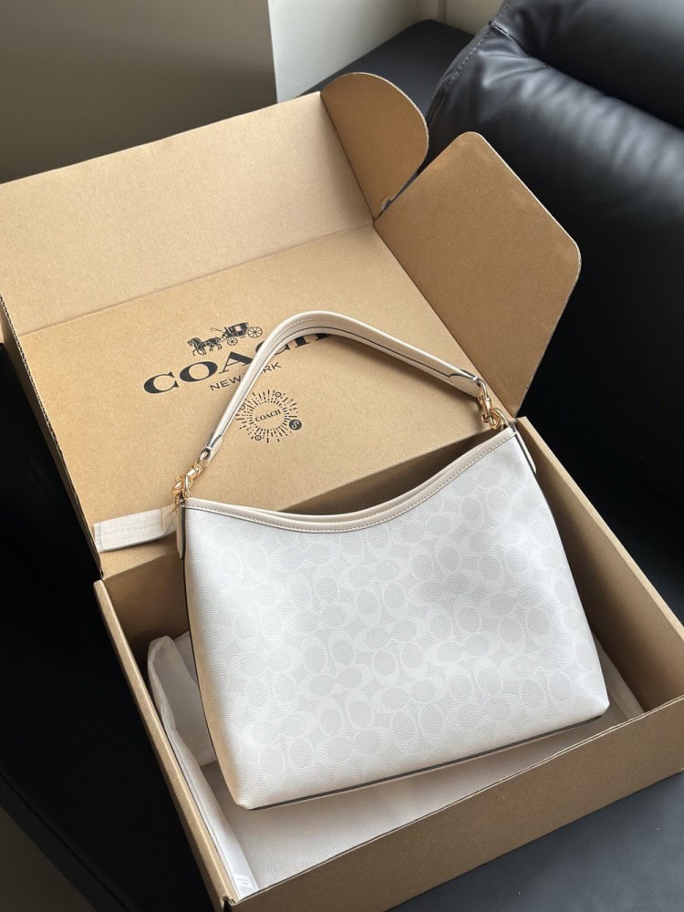 【AT9349】Coachクラシックバケツバッグ - 優雅な白色レザーバッグ、オフィス通勤やデートに最適 | Coach New York