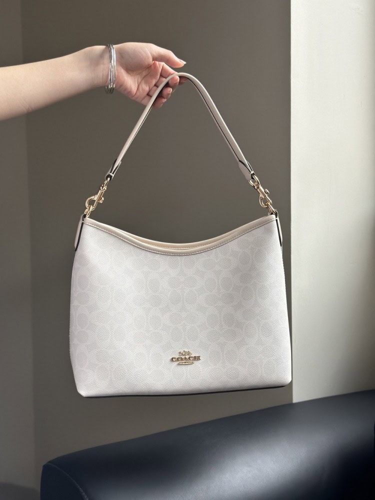 【AT9349】Coachクラシックバケツバッグ - 優雅な白色レザーバッグ、オフィス通勤やデートに最適 | Coach New York