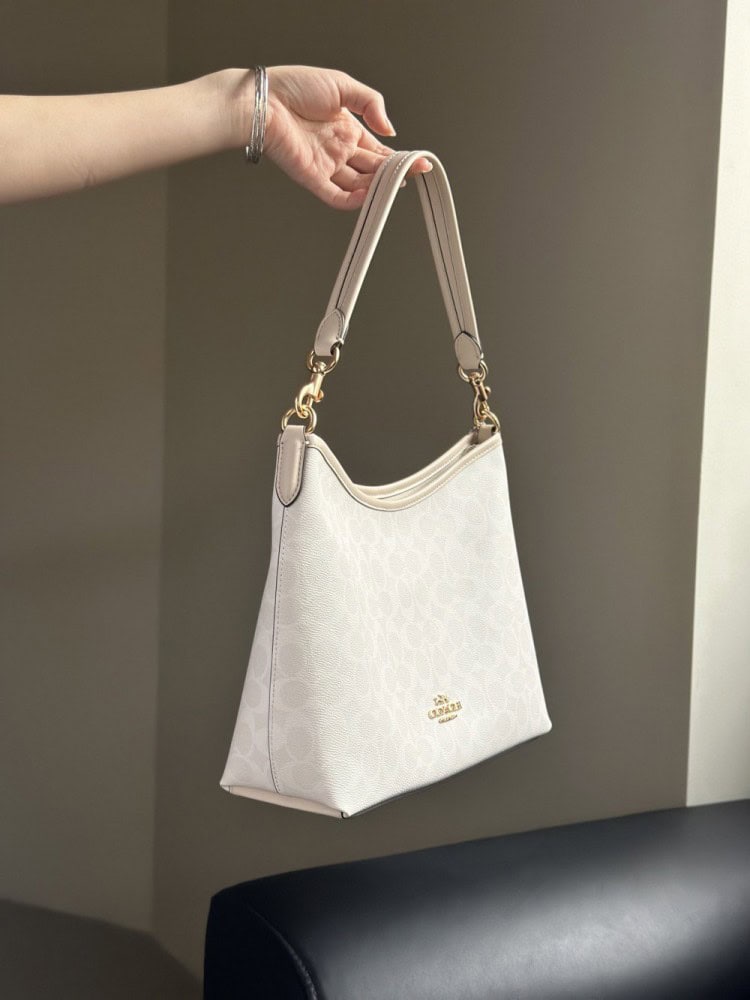 【AT9349】Coachクラシックバケツバッグ - 優雅な白色レザーバッグ、オフィス通勤やデートに最適 | Coach New York